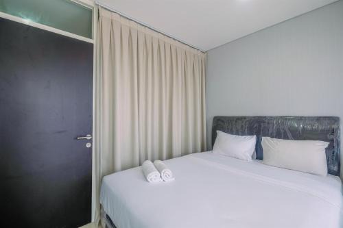 Pondokcina Apartment | Cozy Living 1BR Apartment at Atlanta Residences By Travelio