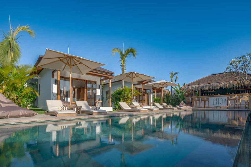 Beraban Hotel | EHOA NYANYI BEACH Boutique Hotel - In front of entrance to NUANU