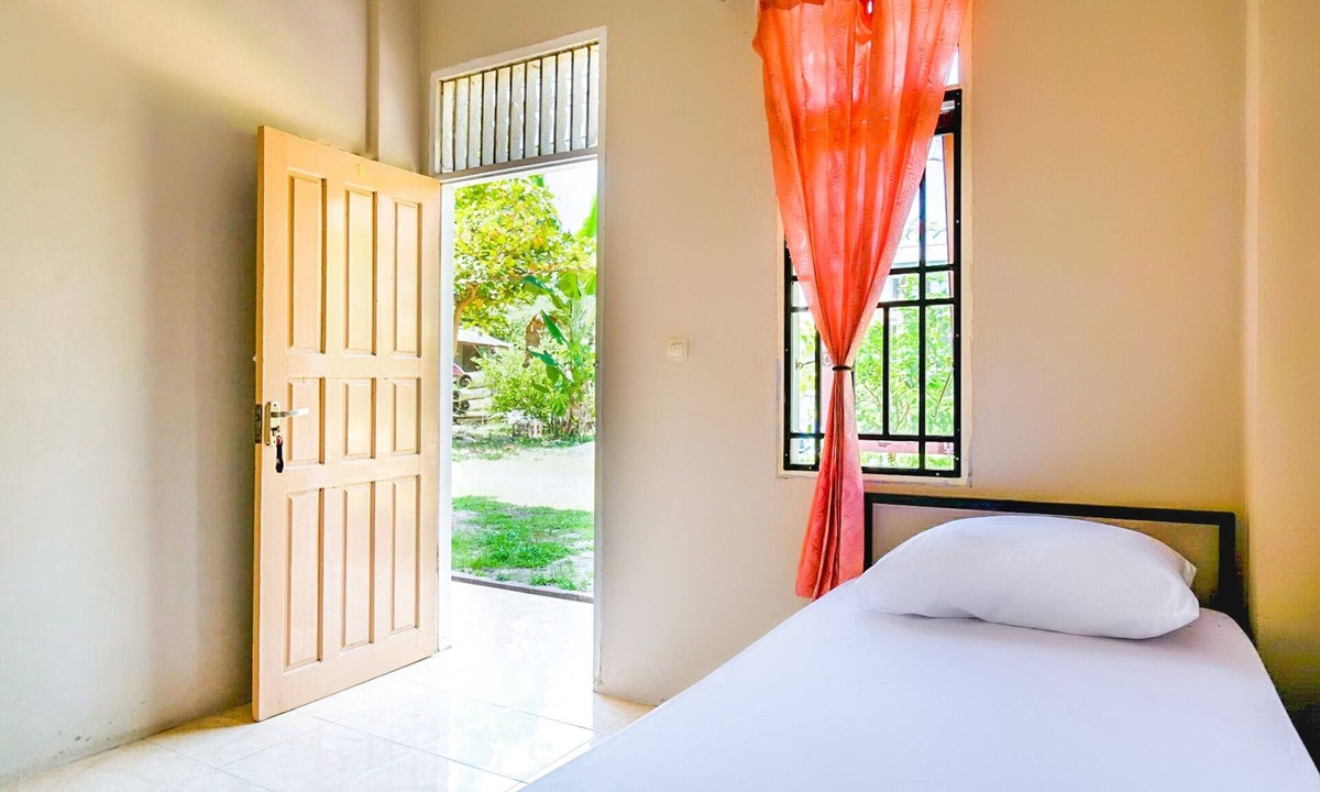 Mandau Hotel | OYO Life 2745 Nabeza House