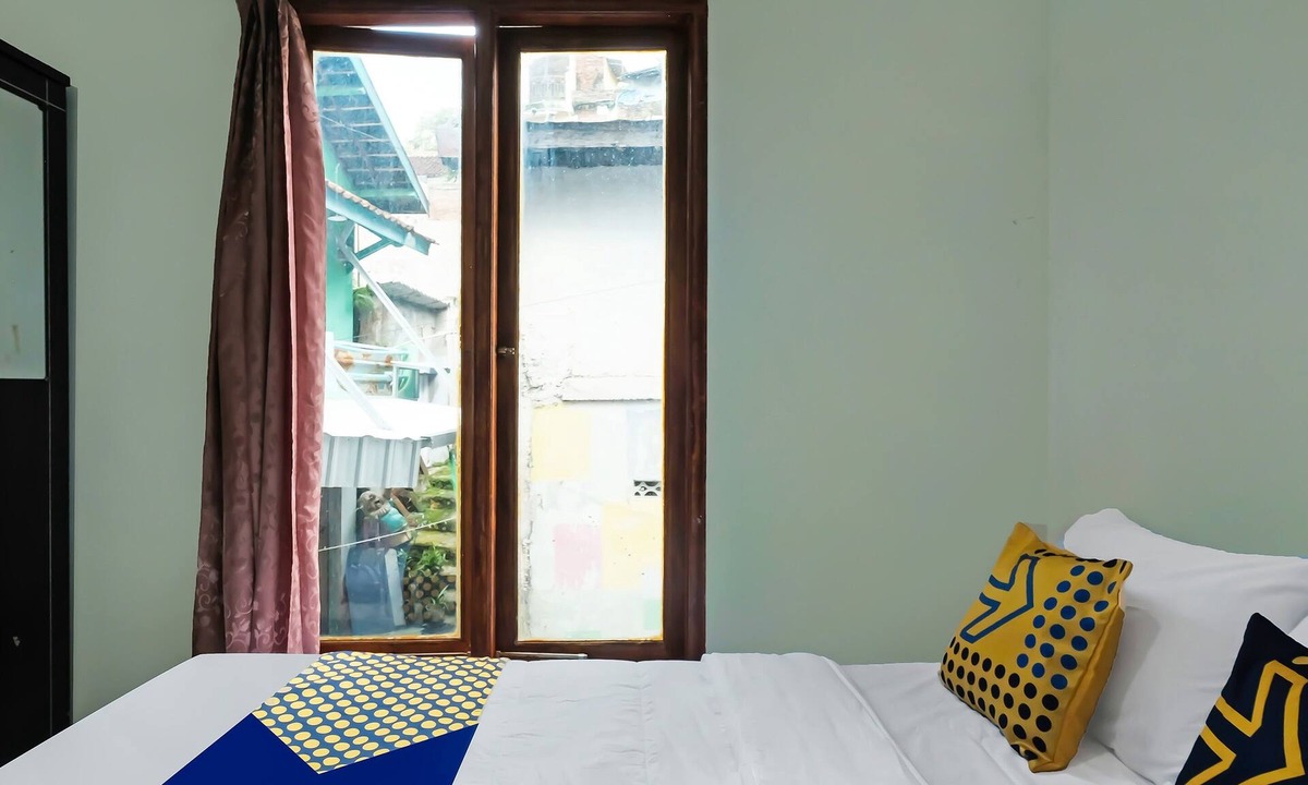 Muncar Hotel | OYO Life 92258 Kostel 21 Syariah