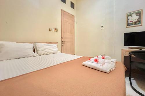 Serpong Hotel | Wisma Anggrek Syariah Mitra Reddoorz