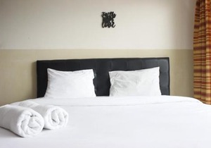 Modern Studio Room at Tamansari La Grande Apartment By Travelio in Bandung