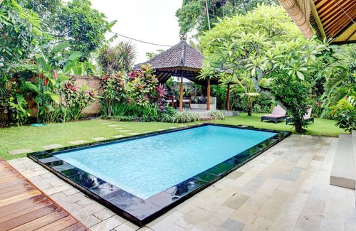 Sunset Road Villa | A funky, inviting jewel of a pool villa set in tropical gardens in Seminyak