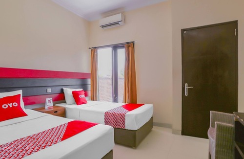 Downtown Kuta Hotel | OYO 4012 Ari Beach Inn