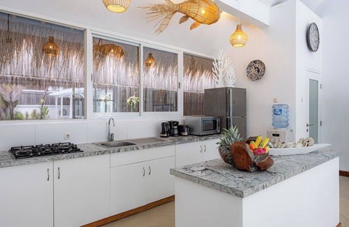 Sunset Road Villa | Thatched Tropical Garden Home with Pool in Trendy Seminyak