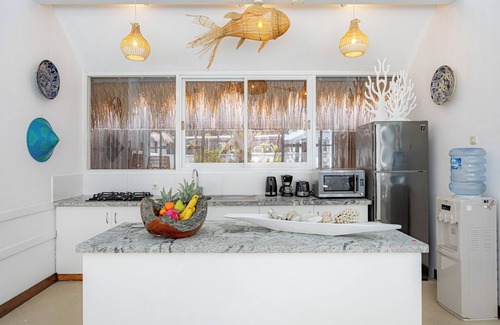 Sunset Road Villa | Thatched Tropical Garden Home with Pool in Trendy Seminyak