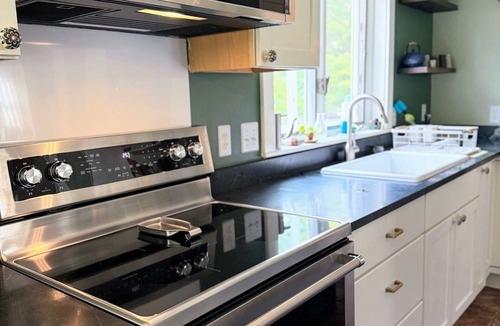 Eau Claire House | Beautiful third ward home with hot tub and close to Downtown and University.