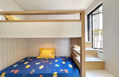 Surabaya House | Charming 4BR House in Northwest Park, West Surabaya by Le Ciel Hospitality