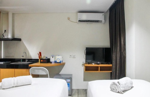 Ciputat Apartment | Cozy Studio Room Bintaro Icon Apartment By Travelio