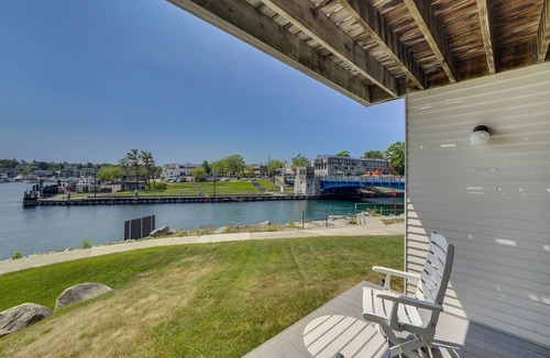 Charlevoix Condo | Edgewater Inn 115 | Sunrise Over Lake Charlevoix | Pool, Hot Tub, Sauna