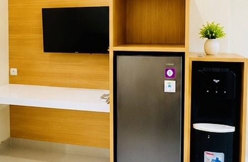 Kampial Apartment | Elimstay Hospitality Jimbaran Bali | Comfort, Pool & Tropical Ambience