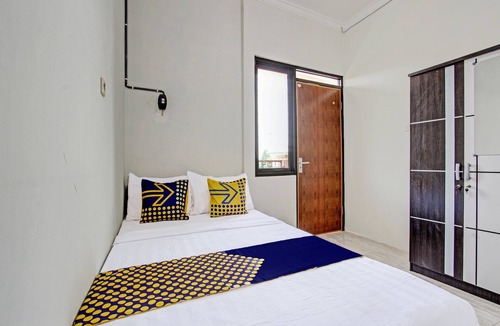 Pati Hotel | Hotel O Kristin Homestay
