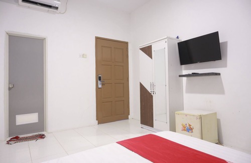 Lubuk Baja Hotel | Hotel O Octav Homestay