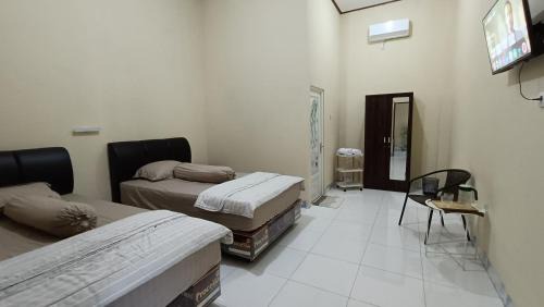 Palangkaraya House | Pink Side Guesthouse