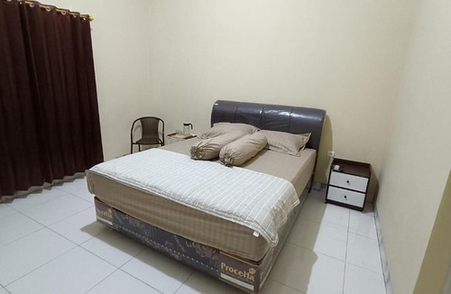 Palangkaraya House | Pink Side Guesthouse