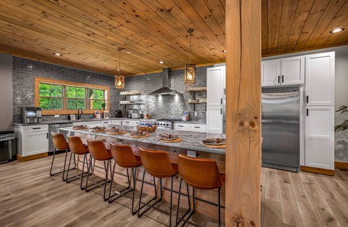 Sevierville Cabin | Smoky Mtn Masterpiece ~ Luxury 6BR w/pool, epic theater, gameroom & views!