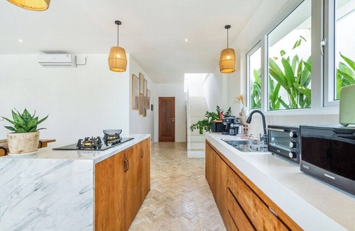 Padonan Villa | Tropical 3BR Canggu Stay w Pool, Balcony & Office