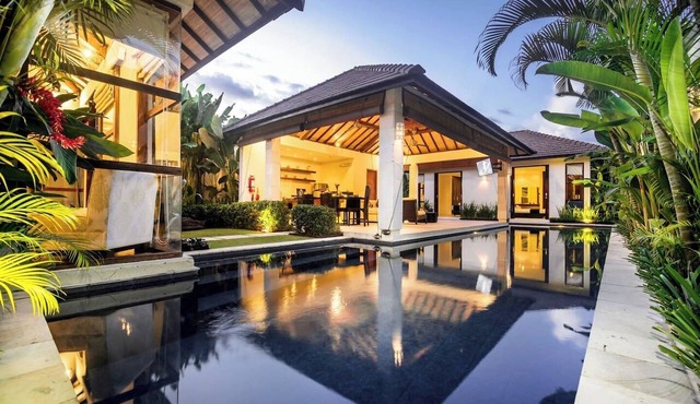 5-bedroom private villa in Seminyak, offering daily breakfast, full-time private chef, airport transfers, complimentary massages, housekeeping, and a dedicated driver.