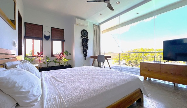 5-minute walk to Petitenget Beach, Bali. Family-sized apartment with 2 pools.