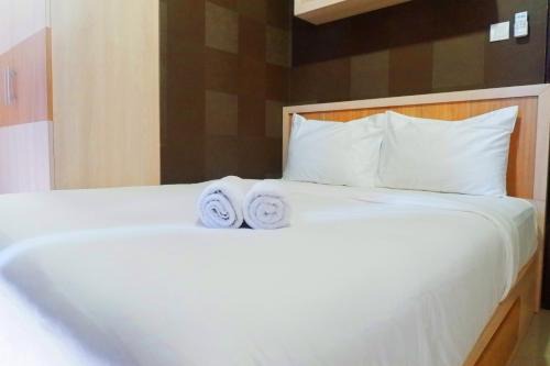 Best View 2BR Apartment at Tamansari Papilio By Travelio in Surabaya