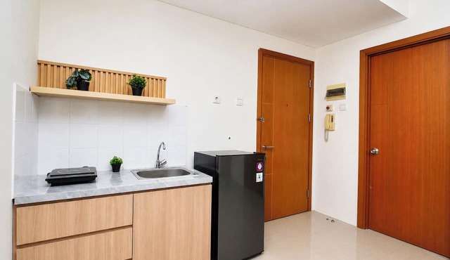 Bright And Cozy 2Br Apartment Woodland Park Residence in Jakarta