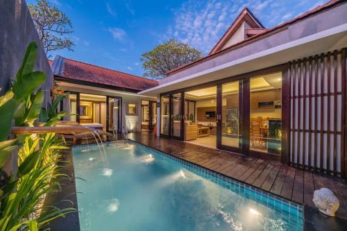 Cozy 2BR villa w- pool & garden views