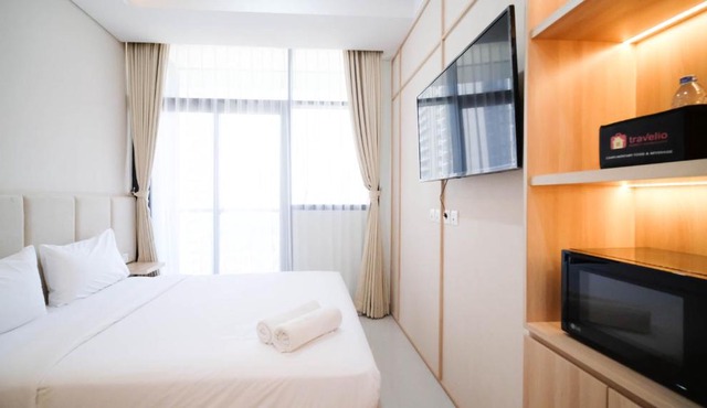 Cozy Studio Connected to Mall at The Vertu Apartment By Travelio in Surabaya