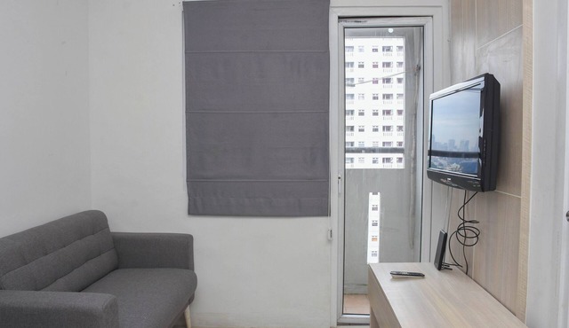 Cozy Style 2BR at Green Pramuka City Apartment