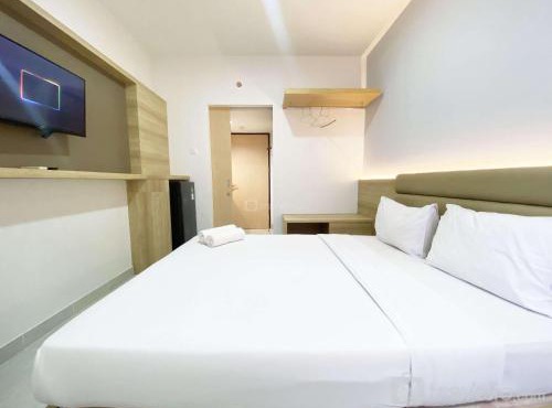Homey and Modern Studio The Alton Apartment By Travelio in Semarang