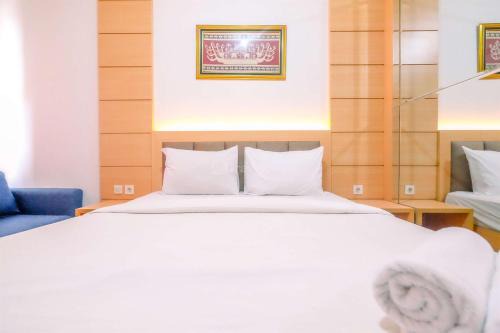 Minimalistic Look Studio Transpark Cibubur Apartment By Travelio in Depok