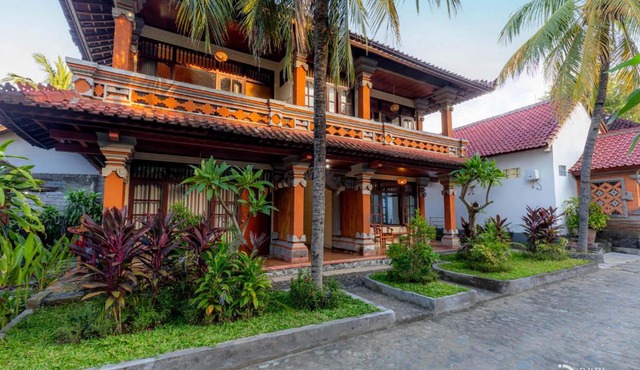 Paradise Palm Beach Bungalows and Dive Center