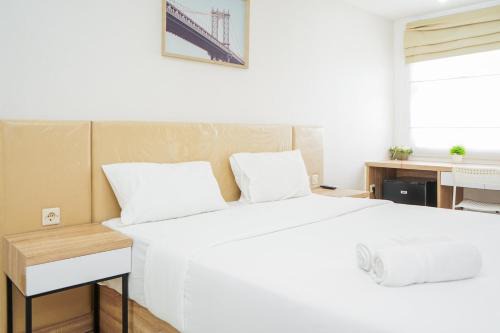 Remarkable Studio at Baileys City Apartment By Travelio in Pondokcabe Hilir