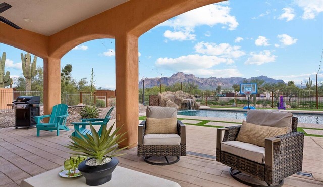 Resort-Style Backyard, Heated Pool, Waterslide, Games & Mountain Views! in Apache Junction