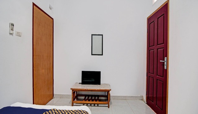 SPOT ON 91950 Guest House TekNong Syariah in Bangkinang