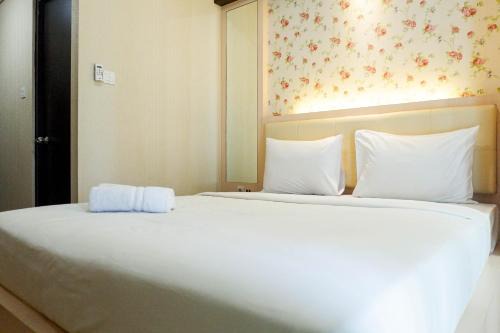 Strategic and Cozy Studio Room Apartment at Tamansari Papilio By Travelio in Surabaya