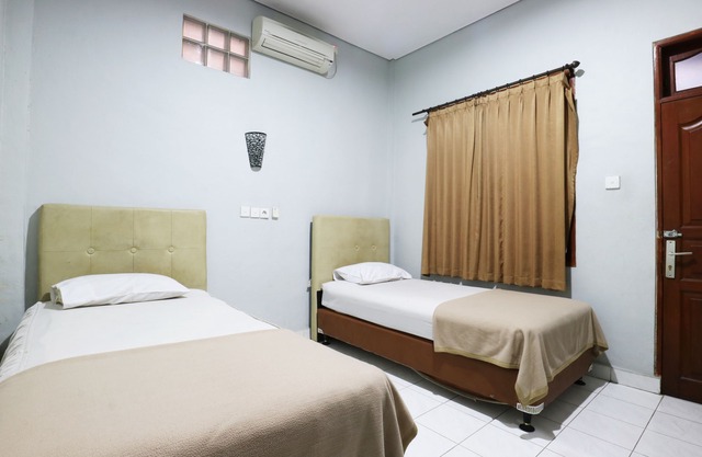 Taman Mekar Beach Inn