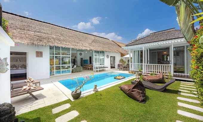 Sunset Road Villa | Thatched Tropical Garden Home with Pool in Trendy Seminyak