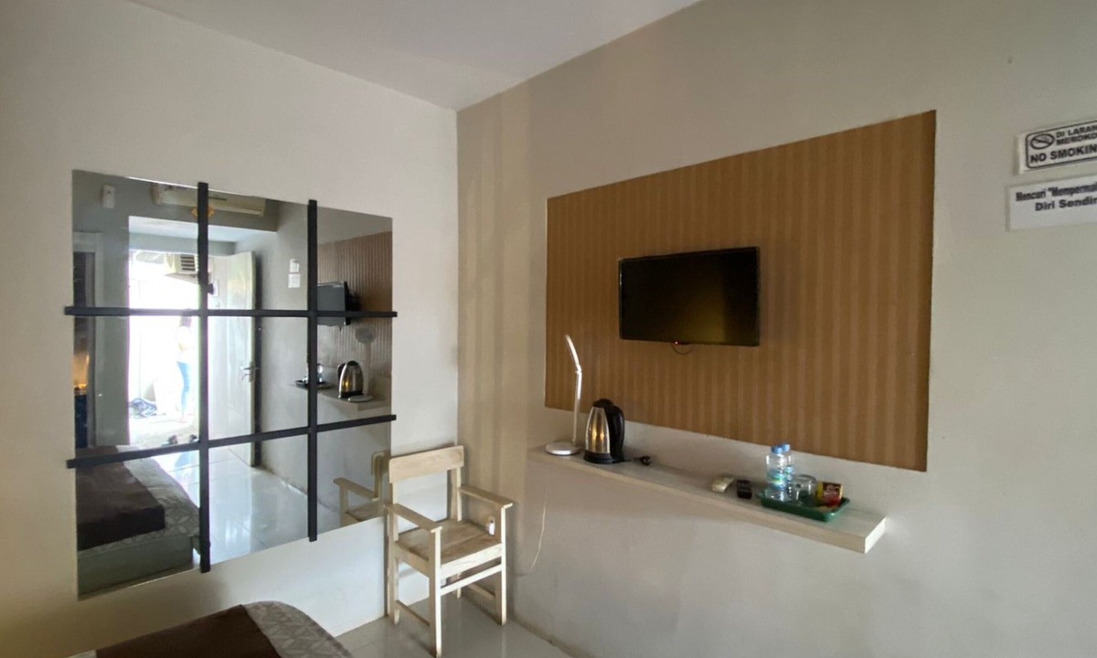 Pati Hotel | Capital O 93450 Hotel D'lala