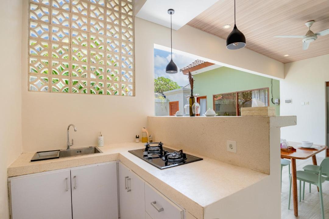 Padonan Villa | KIKI VILLAGE BATHTUB AND LIVING ROOM