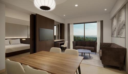 Presidential King Suite with Balcony and Garden View