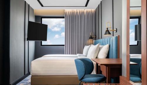 Family Room with One King Bed and Two Single Beds