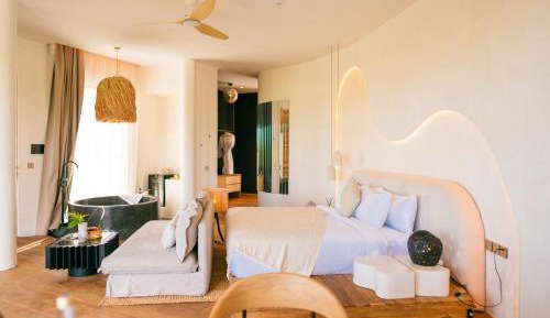 Sunrise Suite with Free 1x 60 Minutes Balinese Massage for 2 Persons, 15% F&B Discount, VIP Access to Luna Beach Club and Nuanu Tour