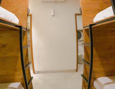 Single Bed in Dormitory Room