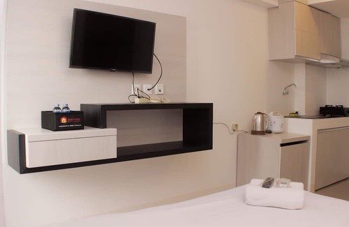 Karawang Apartment | Cozy Living Studio At Urbantown Apartment Karawang