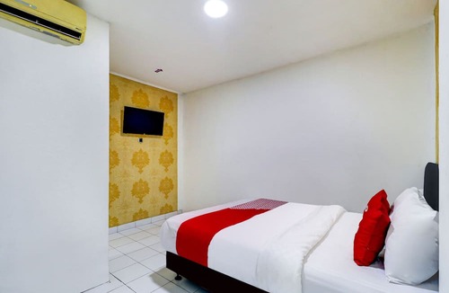 Ngamprah Hotel | OYO 90873 Orchid Guesthouse