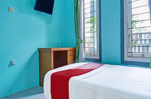 Karawang Hotel | Hotel O Home Stay Elis Cateliya Syariah