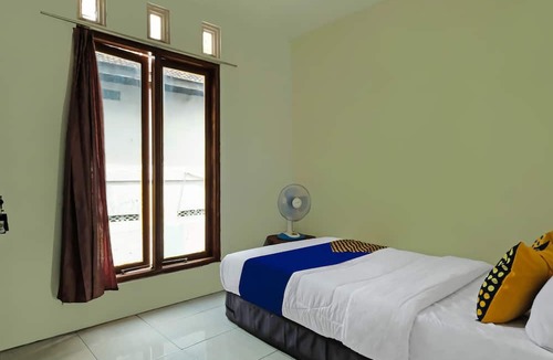 Muncar Hotel | OYO Life 92258 Kostel 21 Syariah