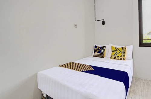 Pati Hotel | Hotel O Kristin Homestay