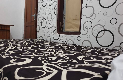 Dinoyo Hotel | OYO Life 92622 Jatiluhur Kost Syariah