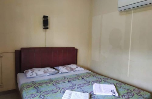 Sukabumi Hotel | Hotel O Penginapan Putri Asih Sawarna